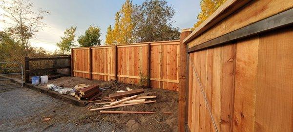 Great picture frame wood fencing with incredible gates.