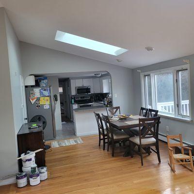 Removed popcorn ceiling and painted it.