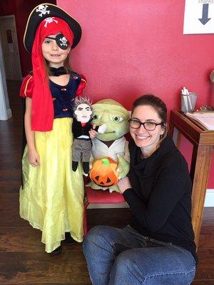 Ms Lily (pictured-right) taking a photo with her student, Emily, after her lesson for Halloween 2016.