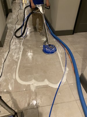 Cleaning tile at business office