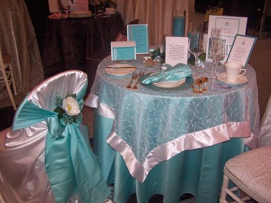 Just one of our many available choices for linens, chair covers, china, flatware, glassware, invitations, etc.