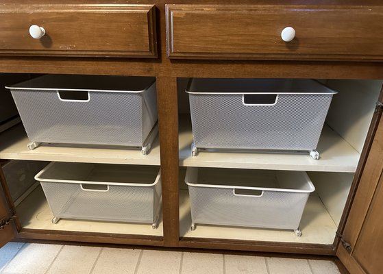 The finished project! The two baskets on the top shelves now join the bottom shelves installed over a decade ago!