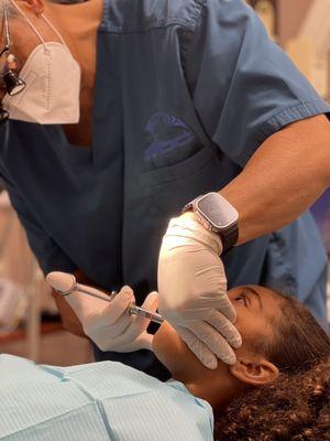 Cavities being filled by the most gentle dentist on the planet.