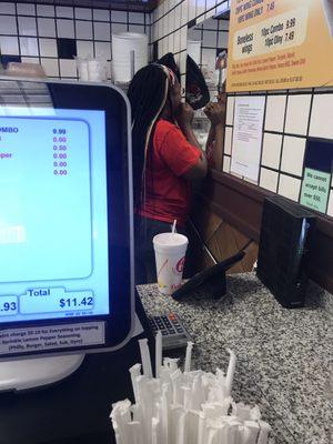 The cashier flossing her braces behind the register. YUCK!