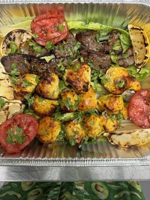 Chicken and beef kebabs with grilled veggies