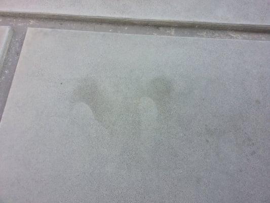 Foot prints from installer. Smaller guy... not pro work at all