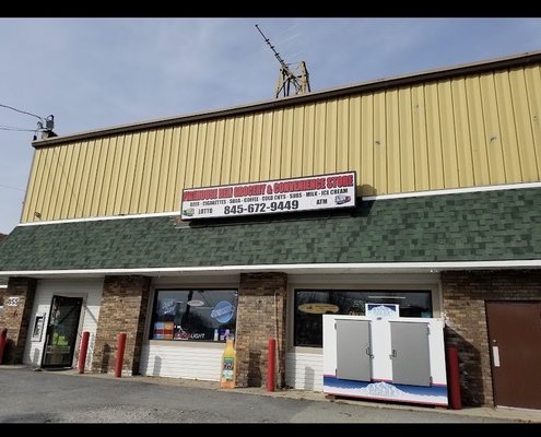 Front of Business. ATM located next to main entrance (outside)