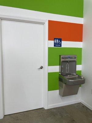 Filtered water station, Gender neutral restrooms, and in this area is a nice clean changing station for those in diapers.