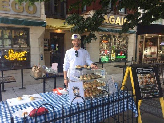 Tyler working the bagel stand