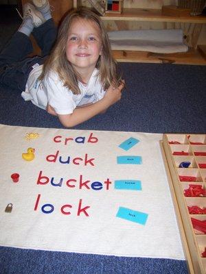 The moveable alphabet empowers children to spell out words.