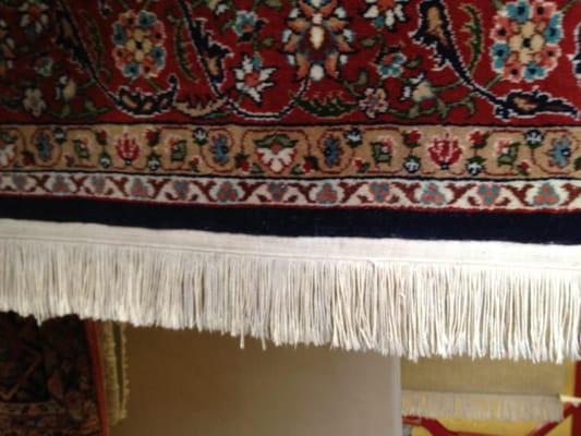 Hand cleaned and detailed fringe on a woven oriental rug done in our rug spa!