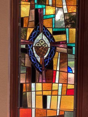 Stained glass window detail near the chapel