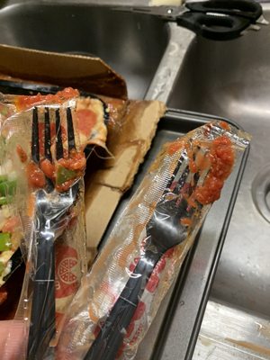 The leakage all over the still-sealed forks provided as I removed them from the bag.