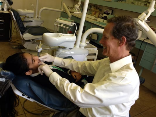 Dr. Halberstadt with a young patient