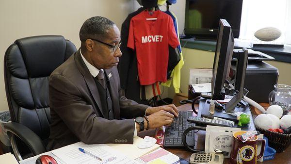 Behind the scenes photo of video shoot of GTB customer, Mr. Kendrick with Maryland Center for Veterans Education and Training (MCVET).