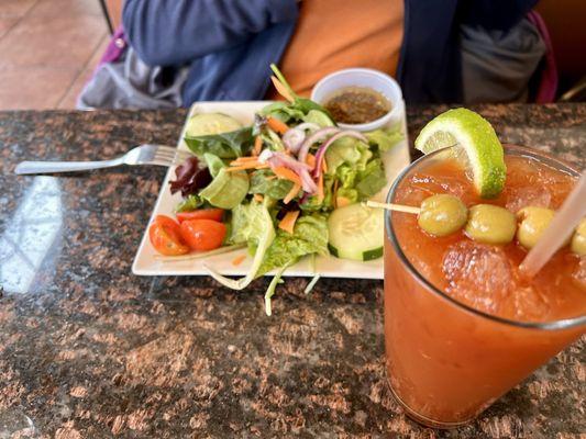 Salad in the background - Bloody Mary foreground