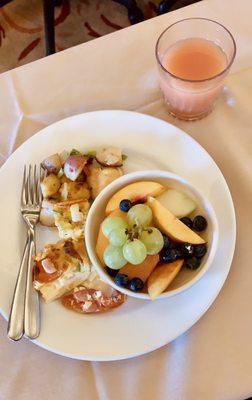 Breakfast frittatas and fruit bowl