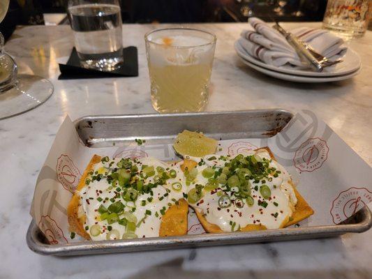 Crab Rangoon nachos and a cucumber clover club cocktail