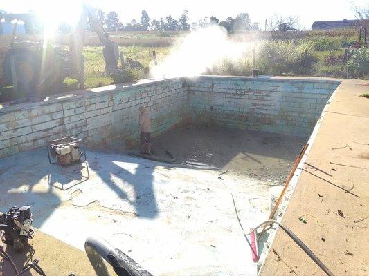 washing an in ground pool, getting ready to shotcrete