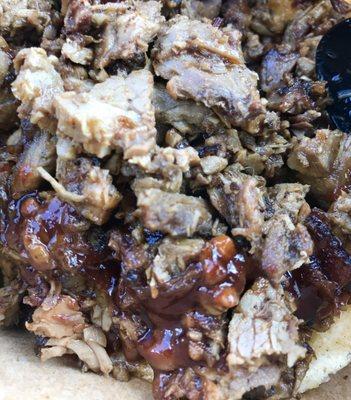 Up close and personal with Deet's CHOPPED beef brisket.  Tastes great.  Best eaten on the bun, or with a spoon.