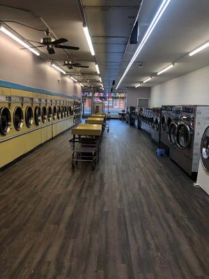 Picture of laundromat from back to front.