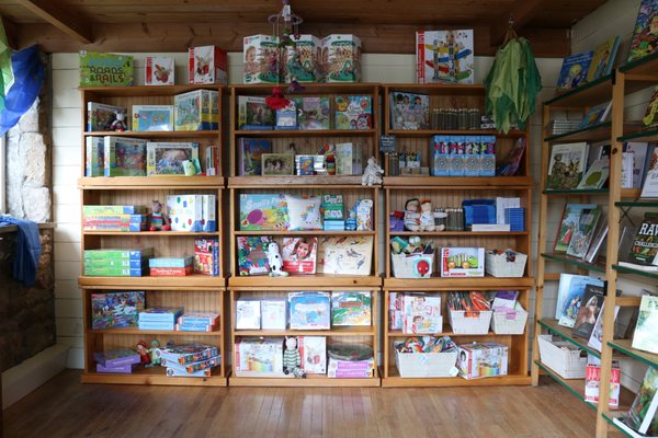 For children: Puzzles and activities, storybooks, alpaca fiber plush toys, organic knitted rattles, and more.