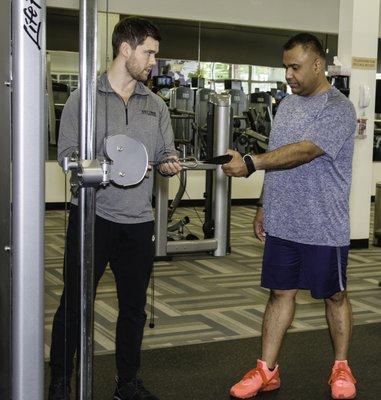 Standing Single Arm Cable Row for building Lats and Upper Back