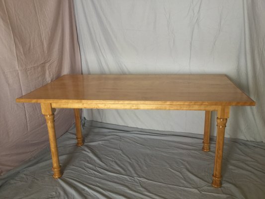 Birch farmhouse table with custom turned legs.