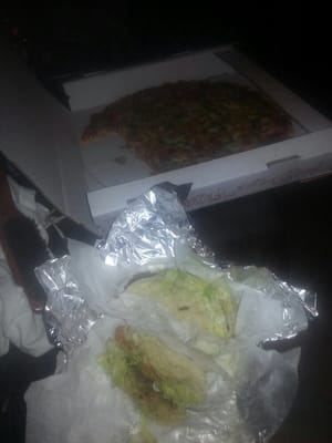 Veggie pizza , veggie taco, and steak taco