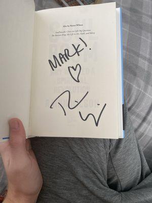 a signed copy of soul boom by Rainn Wilson