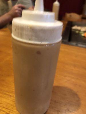 Dirty sauce bottle