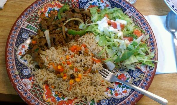 This is what 7 bucks get you. Beef kabob, spiced rice, and a salad.