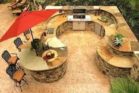 Outdoor kitchen Stacked stone Crab Orchard Stone counter with Stamped concrete