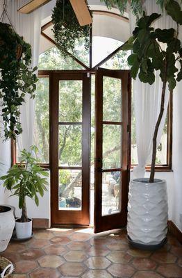 Natural Fir shaker patio doors for this beautiful sunroom.