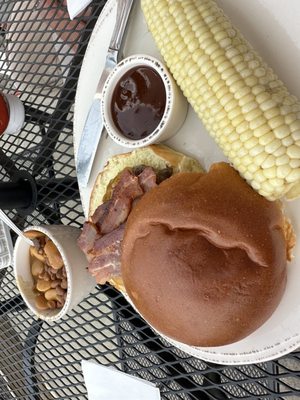 Bison burger with corn and baked beans