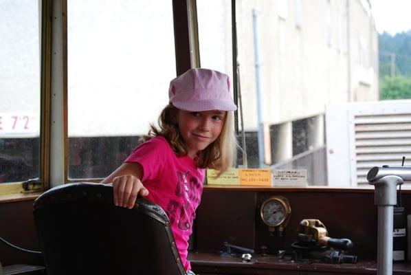 my daughter driving the trolley