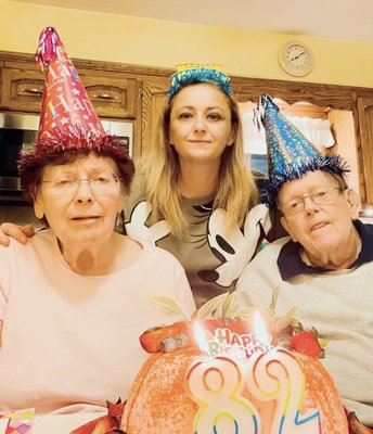 Caregiver Nino with Mr. and Mrs. Rohack