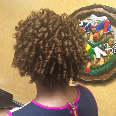 Permanent hair color on natural hair with a rod set