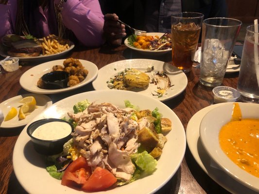 Greek salad w/chicken, fried mushrooms, fried green tomatoes, boom boom shrimps and veggie burger