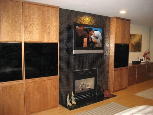 What a difference Roomax cabinetry made to this otherwise ordinary livingroom.  Let us help you design your space.