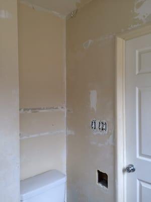 Damaged paint inside bathroom