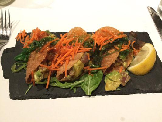 This is a picture of the ahi tuna tacos with kelp, carrots, wonton shell, and avocado