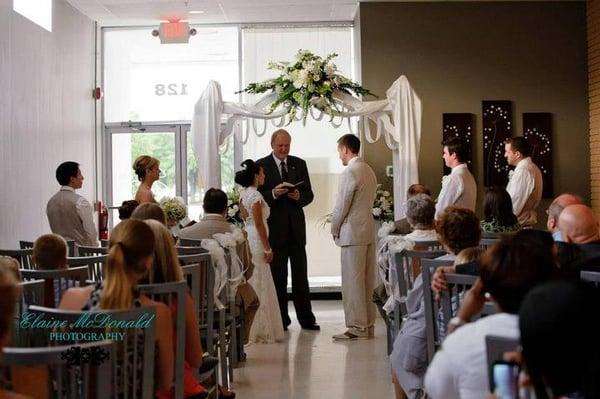 One of our lovely couples says "I do" in the Garden Terrace, one of five different spaces avaiable at SkyView on Hay!