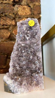 A beautiful high quality amethyst cluster. This could be the piece to complete your office.