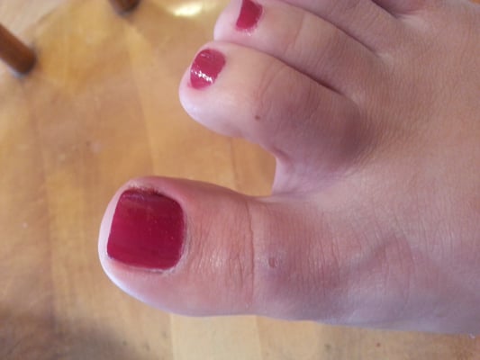 My poor right toe... good thing the polish is color of red otherwise it'd look nasty where she yanked out the hang nail/skin