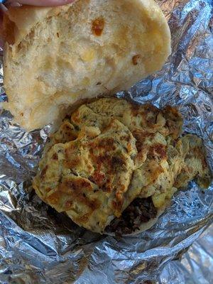 Steak, egg, and cheese with the omelette egg (peppers and onions) so good! Try it with a little ketchup. mmm.