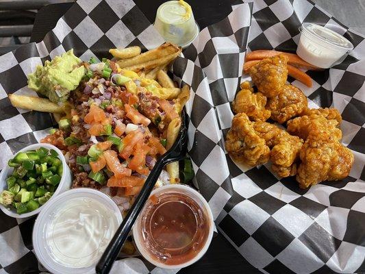 Loaded fries and 1/2 lb boneless sriracha honey chicken