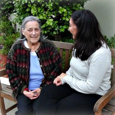 Andrea, Director of Dementia Care, enjoys a visit with her client Betty.