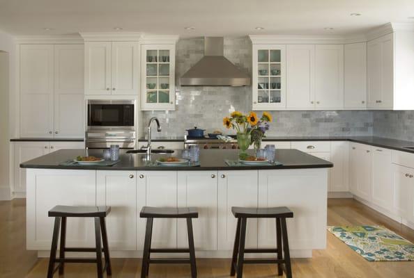 White painted kitchen designed by north shore kitchen showroom Heartwood Kitchens.