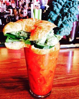 Avocado chicken salad croissant sammich on my Bloody Mary!